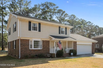 Welcome home! This spacious 4-bedroom 2.5 bathroom beauty is on Jacksonville Country Club in North Carolina - for sale on GolfHomes.com, golf home, golf lot