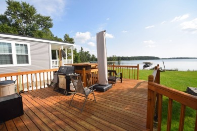 Two-bedroom one bath located on Roy Lake. 1991 14 x 50 mobile on Roy View Golf Course in South Dakota - for sale on GolfHomes.com, golf home, golf lot