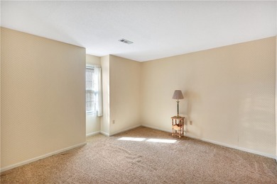 This traditional 4-bedroom, 3-bathroom home overlooks the 2nd on Cobbs Glen Country Club in South Carolina - for sale on GolfHomes.com, golf home, golf lot