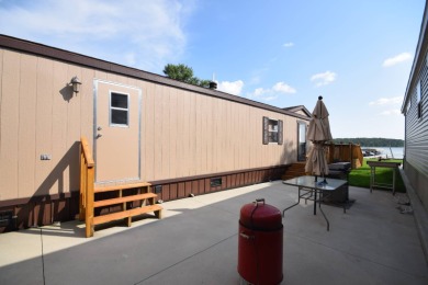 Two-bedroom one bath located on Roy Lake. 1991 14 x 50 mobile on Roy View Golf Course in South Dakota - for sale on GolfHomes.com, golf home, golf lot