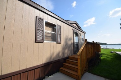 Two-bedroom one bath located on Roy Lake. 1991 14 x 50 mobile on Roy View Golf Course in South Dakota - for sale on GolfHomes.com, golf home, golf lot