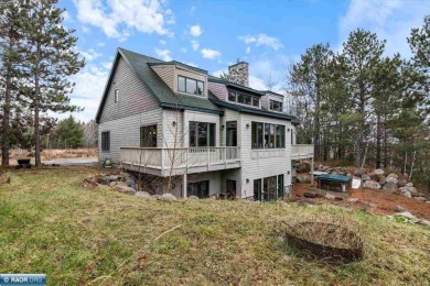 Welcome to this stunning, lake access retreat nestled in the on Giants Ridge Golf and Ski Resort - The Quarry in Minnesota - for sale on GolfHomes.com, golf home, golf lot