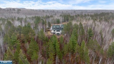 Welcome to this stunning, lake access retreat nestled in the on Giants Ridge Golf and Ski Resort - The Quarry in Minnesota - for sale on GolfHomes.com, golf home, golf lot