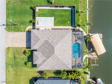 Experience the pinnacle of WATERFRONT LUXURY LIVING in this on Burnt Store Golf Club in Florida - for sale on GolfHomes.com, golf home, golf lot