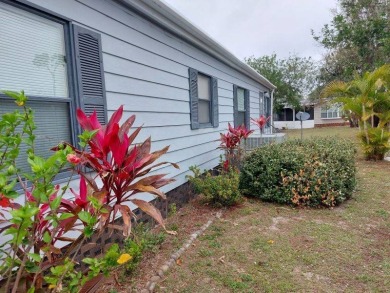 Lot Rent is $1,185.00 monthly. This is a 2-bedroom 2 bath on Lake Fairways Country Club in Florida - for sale on GolfHomes.com, golf home, golf lot