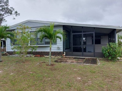 Lot Rent is $1,185.00 monthly. This is a 2-bedroom 2 bath on Lake Fairways Country Club in Florida - for sale on GolfHomes.com, golf home, golf lot