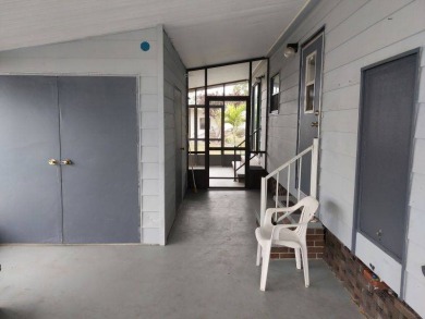 Lot Rent is $1,185.00 monthly. This is a 2-bedroom 2 bath on Lake Fairways Country Club in Florida - for sale on GolfHomes.com, golf home, golf lot