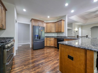 This stunning 4-bed, 3-bath ranch in Romeo offers 1,900 sq. ft on The Glacier Club in Michigan - for sale on GolfHomes.com, golf home, golf lot