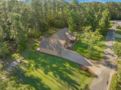 Nestled at 185 Ashley Dr, Brookeland, TX, this stunning Lake Sam on Rayburn Country Club in Texas - for sale on GolfHomes.com, golf home, golf lot