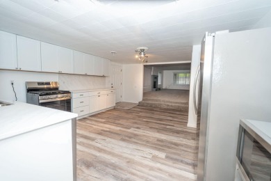 Amazing remodel just completed on this 4 bed 2 bath home. 2 car on Pine View Highlands Golf Course in Michigan - for sale on GolfHomes.com, golf home, golf lot