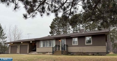 Beautiful home nestled on just over half an acre.  One level on Eveleth Municipal Golf Course in Minnesota - for sale on GolfHomes.com, golf home, golf lot