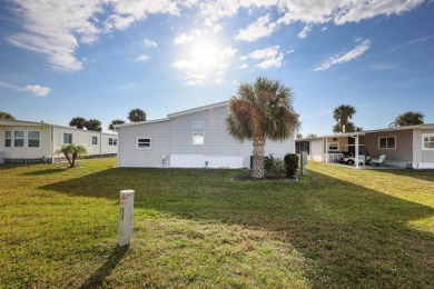 You might just fall in love when you drive up and see how lovely on Maple Leaf Golf and Country Club in Florida - for sale on GolfHomes.com, golf home, golf lot
