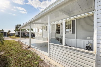 You might just fall in love when you drive up and see how lovely on Maple Leaf Golf and Country Club in Florida - for sale on GolfHomes.com, golf home, golf lot