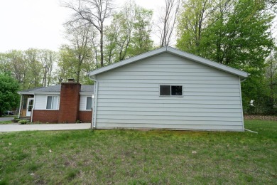 Amazing remodel just completed on this 4 bed 2 bath home. 2 car on Pine View Highlands Golf Course in Michigan - for sale on GolfHomes.com, golf home, golf lot
