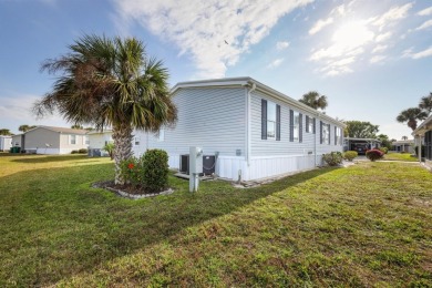 You might just fall in love when you drive up and see how lovely on Maple Leaf Golf and Country Club in Florida - for sale on GolfHomes.com, golf home, golf lot