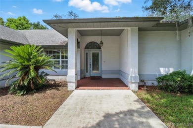 Majestic oak trees and sago palms welcome you to this beautiful on Sugarmill Woods Golf and Country Club in Florida - for sale on GolfHomes.com, golf home, golf lot