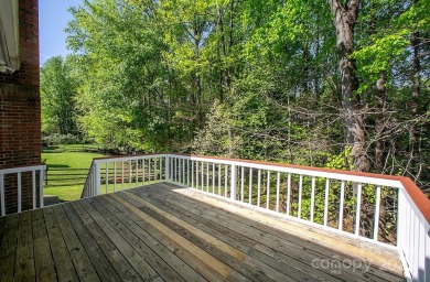 Wonderfully renovated home located on a private, wooded lot on on The Tradition Golf Club in North Carolina - for sale on GolfHomes.com, golf home, golf lot