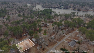 The Ultimate Getaway at Lake Royale! Come visit this lake and on River Golf and Country Club at Lake Royale in North Carolina - for sale on GolfHomes.com, golf home, golf lot