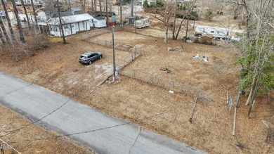 The Ultimate Getaway at Lake Royale! Come visit this lake and on River Golf and Country Club at Lake Royale in North Carolina - for sale on GolfHomes.com, golf home, golf lot