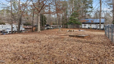 The Ultimate Getaway at Lake Royale! Come visit this lake and on River Golf and Country Club at Lake Royale in North Carolina - for sale on GolfHomes.com, golf home, golf lot