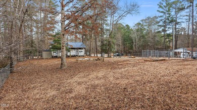 The Ultimate Getaway at Lake Royale! Come visit this lake and on River Golf and Country Club at Lake Royale in North Carolina - for sale on GolfHomes.com, golf home, golf lot