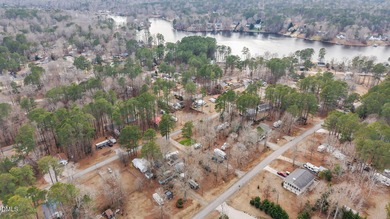 The Ultimate Getaway at Lake Royale! Come visit this lake and on River Golf and Country Club at Lake Royale in North Carolina - for sale on GolfHomes.com, golf home, golf lot