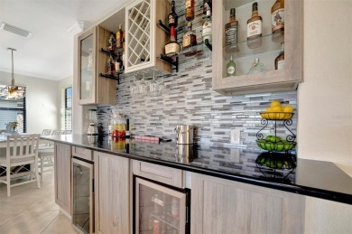 This stunning three-bedroom, two-bath second floor coach home on Lakewood National Golf Club in Florida - for sale on GolfHomes.com, golf home, golf lot