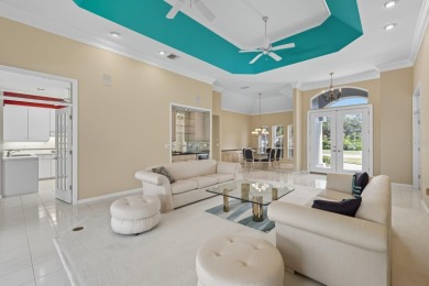 THIS LOVELY LAKEFRONT HOME IS SITUATED IN EATON PLACE, WHICH IS on University Park Country Club in Florida - for sale on GolfHomes.com, golf home, golf lot