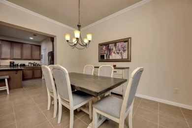 This beautifully maintained corner lot half duplex home is on Wildhorse Golf Club of Robson Ranch in Texas - for sale on GolfHomes.com, golf home, golf lot
