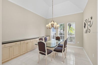 THIS LOVELY LAKEFRONT HOME IS SITUATED IN EATON PLACE, WHICH IS on University Park Country Club in Florida - for sale on GolfHomes.com, golf home, golf lot