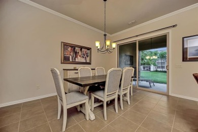 This beautifully maintained corner lot half duplex home is on Wildhorse Golf Club of Robson Ranch in Texas - for sale on GolfHomes.com, golf home, golf lot