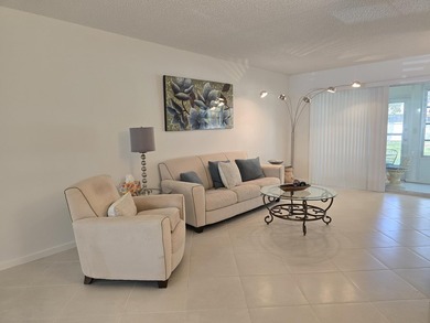 STEP INTO THE SIMPLE ELEGANCE OF THIS GROUND FLOOR CORNER IN on Wynmoor Golf Course in Florida - for sale on GolfHomes.com, golf home, golf lot