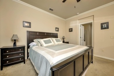 This beautifully maintained corner lot half duplex home is on Wildhorse Golf Club of Robson Ranch in Texas - for sale on GolfHomes.com, golf home, golf lot