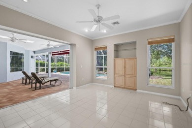 THIS LOVELY LAKEFRONT HOME IS SITUATED IN EATON PLACE, WHICH IS on University Park Country Club in Florida - for sale on GolfHomes.com, golf home, golf lot