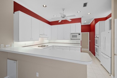 THIS LOVELY LAKEFRONT HOME IS SITUATED IN EATON PLACE, WHICH IS on University Park Country Club in Florida - for sale on GolfHomes.com, golf home, golf lot