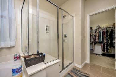 This beautifully maintained corner lot half duplex home is on Wildhorse Golf Club of Robson Ranch in Texas - for sale on GolfHomes.com, golf home, golf lot