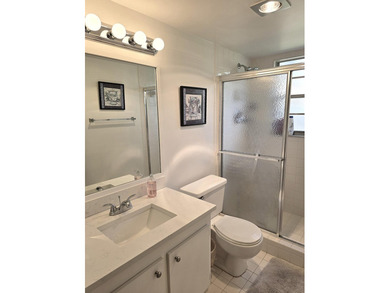 STEP INTO THE SIMPLE ELEGANCE OF THIS GROUND FLOOR CORNER IN on Wynmoor Golf Course in Florida - for sale on GolfHomes.com, golf home, golf lot