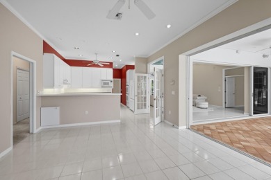 THIS LOVELY LAKEFRONT HOME IS SITUATED IN EATON PLACE, WHICH IS on University Park Country Club in Florida - for sale on GolfHomes.com, golf home, golf lot