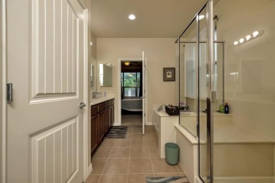This beautifully maintained corner lot half duplex home is on Wildhorse Golf Club of Robson Ranch in Texas - for sale on GolfHomes.com, golf home, golf lot