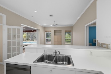 THIS LOVELY LAKEFRONT HOME IS SITUATED IN EATON PLACE, WHICH IS on University Park Country Club in Florida - for sale on GolfHomes.com, golf home, golf lot