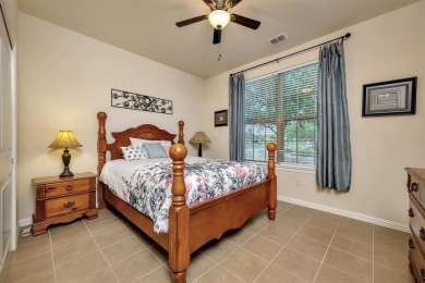 This beautifully maintained corner lot half duplex home is on Wildhorse Golf Club of Robson Ranch in Texas - for sale on GolfHomes.com, golf home, golf lot