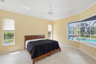 THIS LOVELY LAKEFRONT HOME IS SITUATED IN EATON PLACE, WHICH IS on University Park Country Club in Florida - for sale on GolfHomes.com, golf home, golf lot