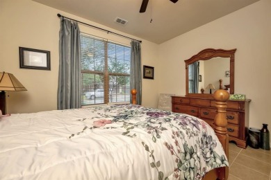 This beautifully maintained corner lot half duplex home is on Wildhorse Golf Club of Robson Ranch in Texas - for sale on GolfHomes.com, golf home, golf lot
