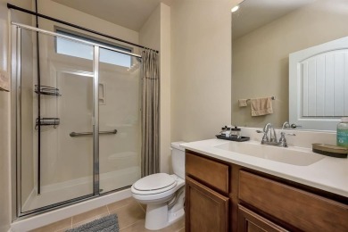 This beautifully maintained corner lot half duplex home is on Wildhorse Golf Club of Robson Ranch in Texas - for sale on GolfHomes.com, golf home, golf lot