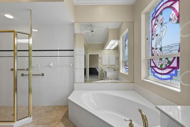 THIS LOVELY LAKEFRONT HOME IS SITUATED IN EATON PLACE, WHICH IS on University Park Country Club in Florida - for sale on GolfHomes.com, golf home, golf lot