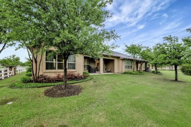 This beautifully maintained corner lot half duplex home is on Wildhorse Golf Club of Robson Ranch in Texas - for sale on GolfHomes.com, golf home, golf lot