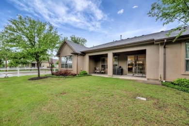 This beautifully maintained corner lot half duplex home is on Wildhorse Golf Club of Robson Ranch in Texas - for sale on GolfHomes.com, golf home, golf lot