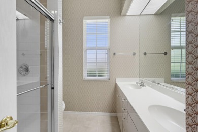 THIS LOVELY LAKEFRONT HOME IS SITUATED IN EATON PLACE, WHICH IS on University Park Country Club in Florida - for sale on GolfHomes.com, golf home, golf lot