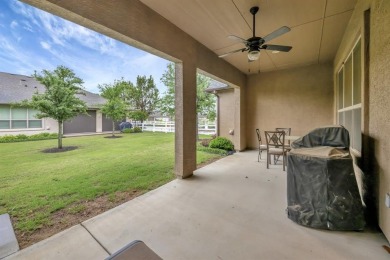 This beautifully maintained corner lot half duplex home is on Wildhorse Golf Club of Robson Ranch in Texas - for sale on GolfHomes.com, golf home, golf lot