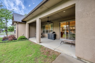 This beautifully maintained corner lot half duplex home is on Wildhorse Golf Club of Robson Ranch in Texas - for sale on GolfHomes.com, golf home, golf lot